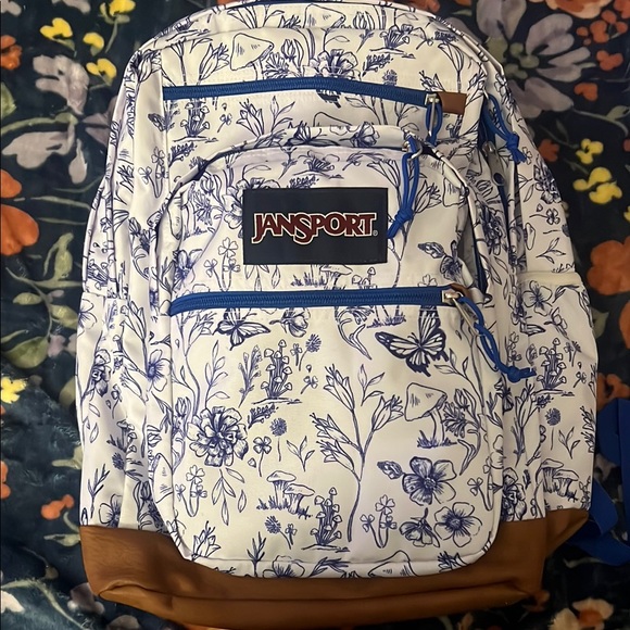 Jansport Handbags - Jansport Blue and Brown Backpack with Floral Design BNWT